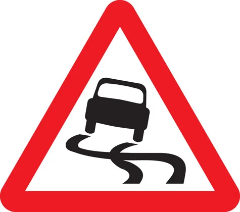 UK slippery road warning sign